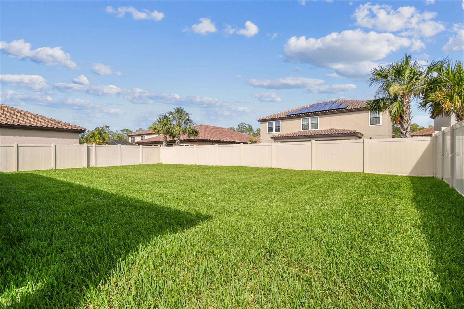 TREMENDOUS POOL-SIZED YARD with PRIVACY FENCE!