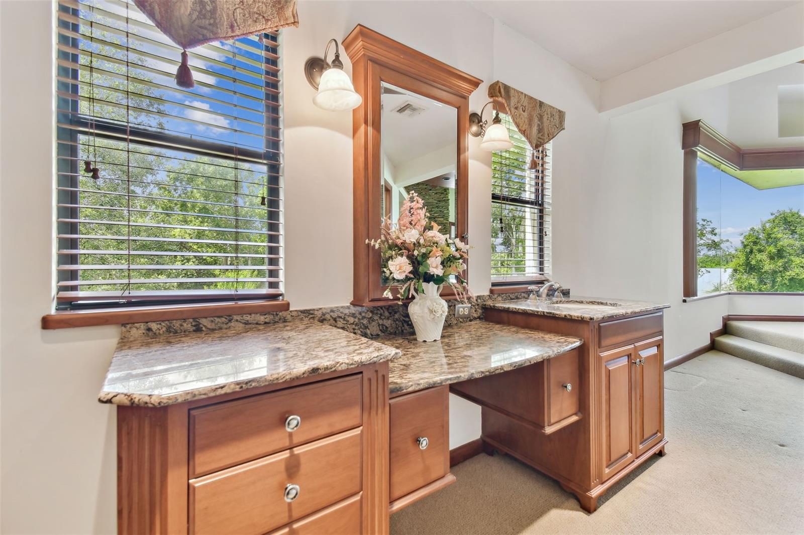 Dual vanities with make up area