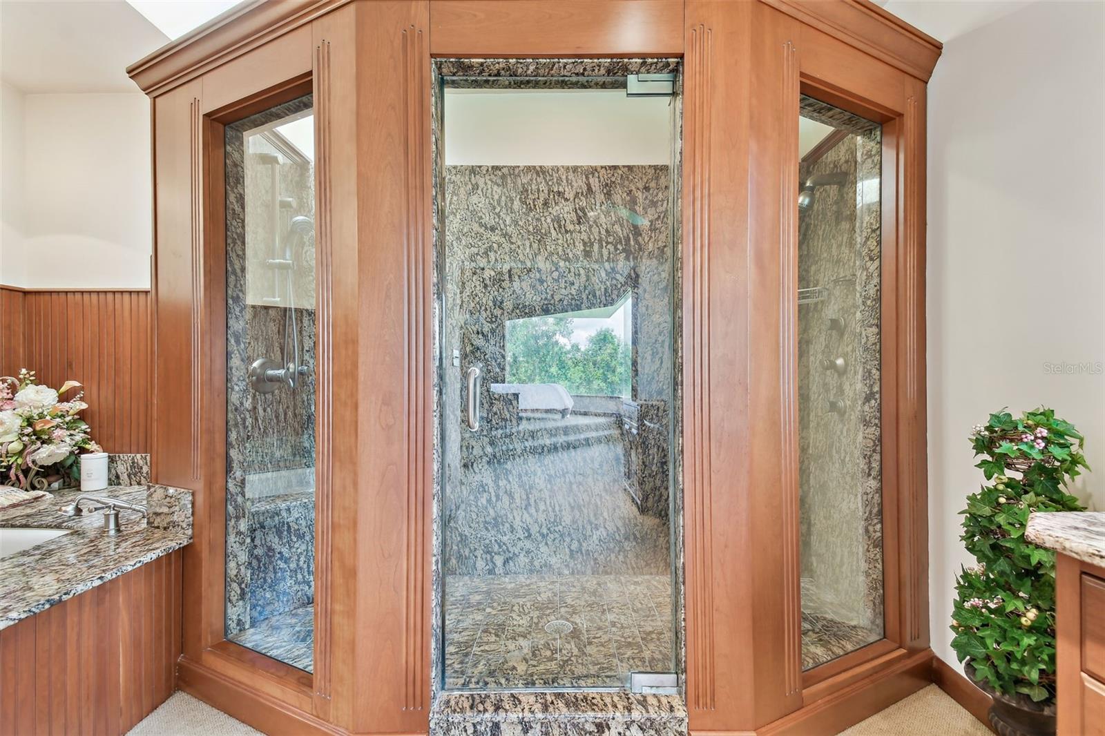 Granite shower with multiple shower heads