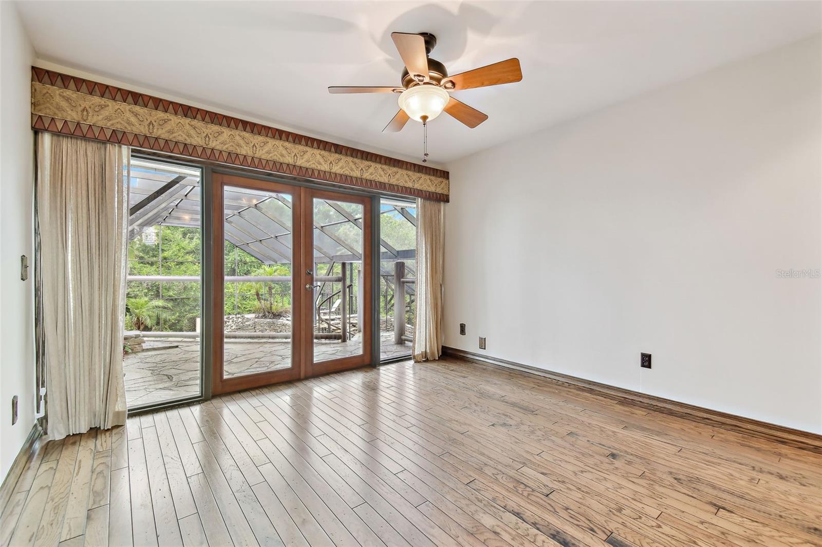 Bedroom #2with private balcony & spiral staircase to lanai