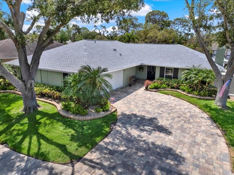 Front View of home with enlarged driveway.