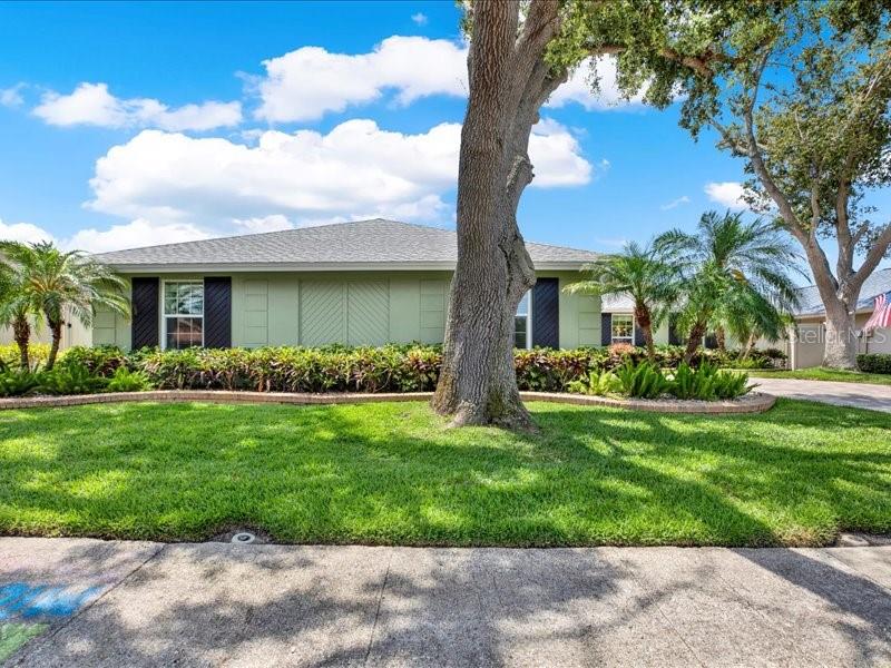 Landscaping is beautiful surrounding this home.