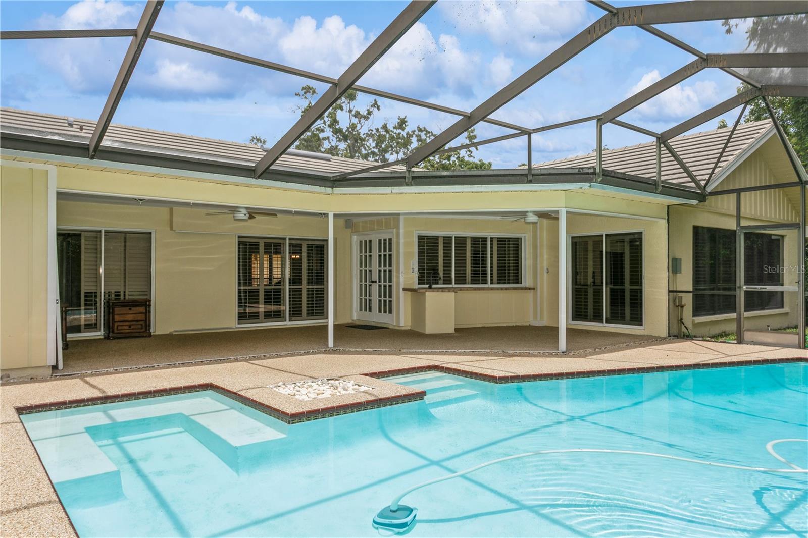 Pool and Patio with Screened-in Enclosure