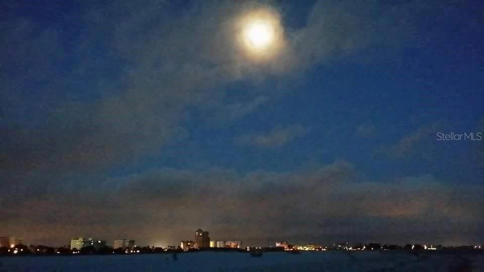 Full moon overlooking Treasure Island hotels including Tropic Terrace.