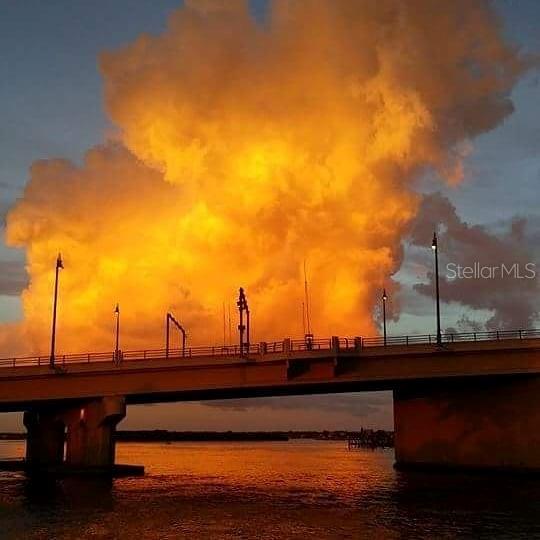 THIS was a photo I took one night on Madeira Beach at sunset and I turned around looked east, back towards where we were parked and could NOT believe the sky I saw.  The placement of this cloud and the color of it literally made it look like the John's Pass Bridge was on fire.  That was incredible to view in person and take this photo that evening.