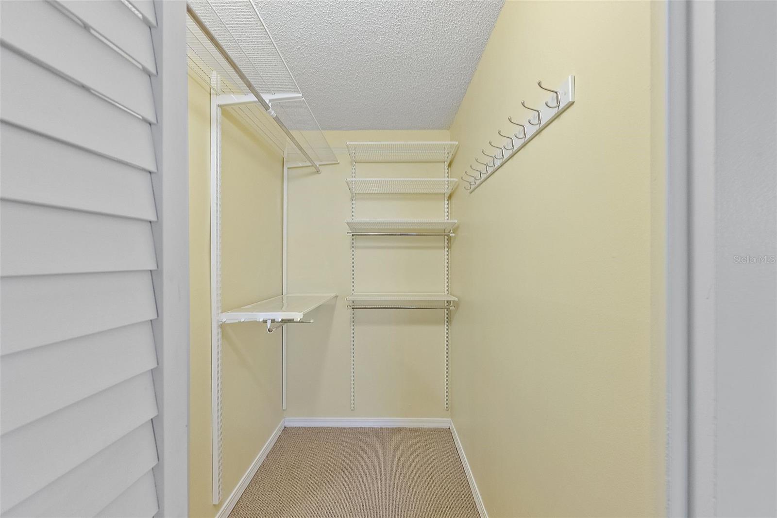 PRIMARY BEDROOM'S WALK IN CLOSET