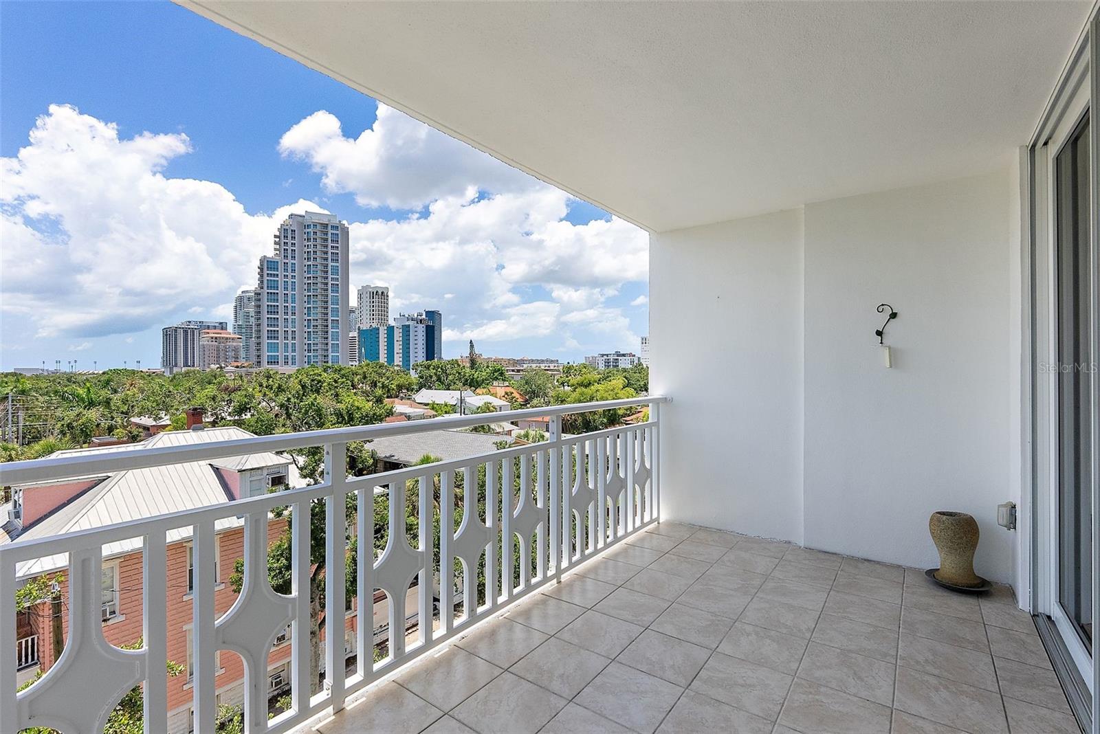 TILED BALCONY WITH VIEWS OF DOWNTOWN