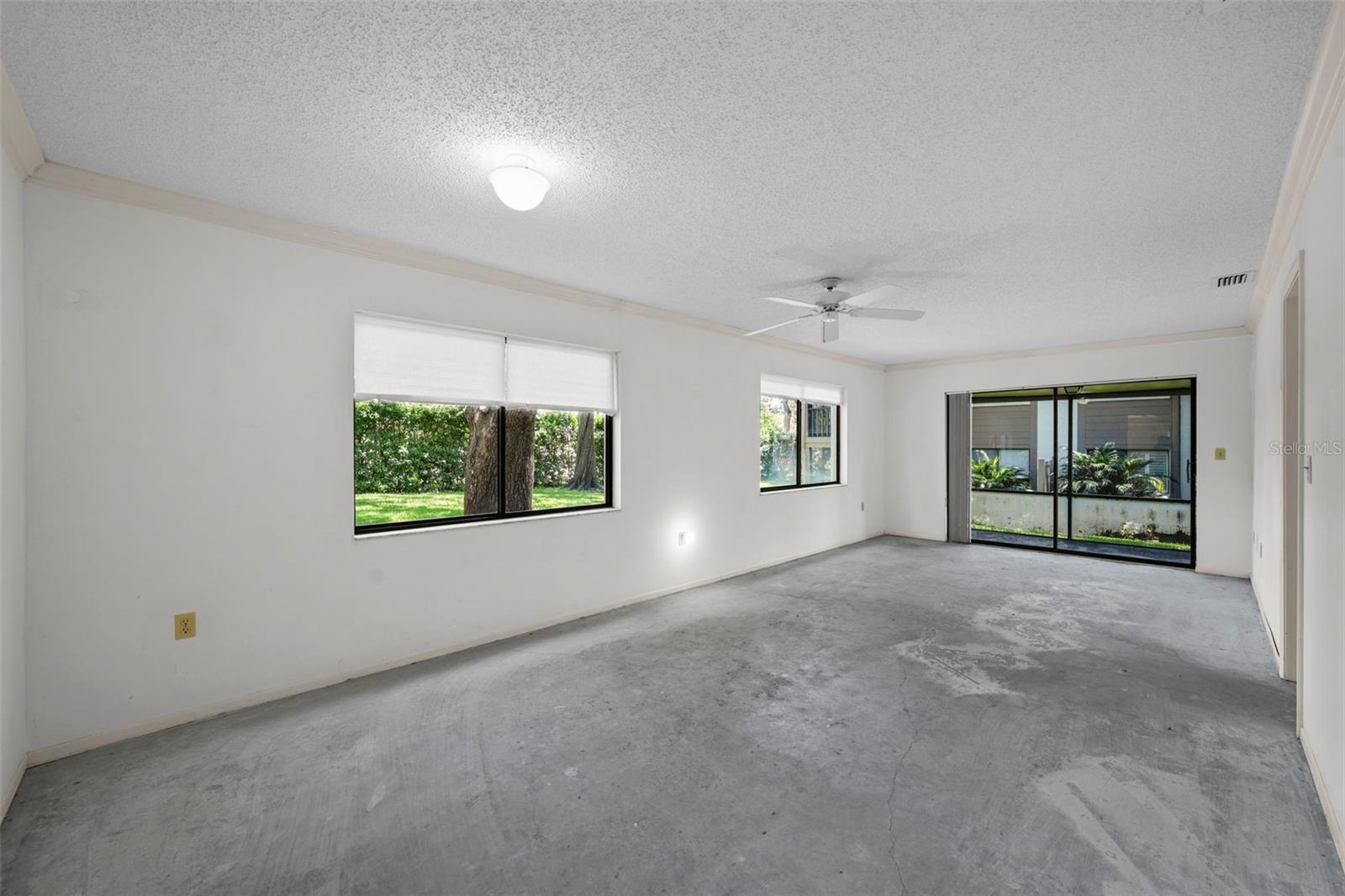 HUGE family room with pretty views of yard, trees!