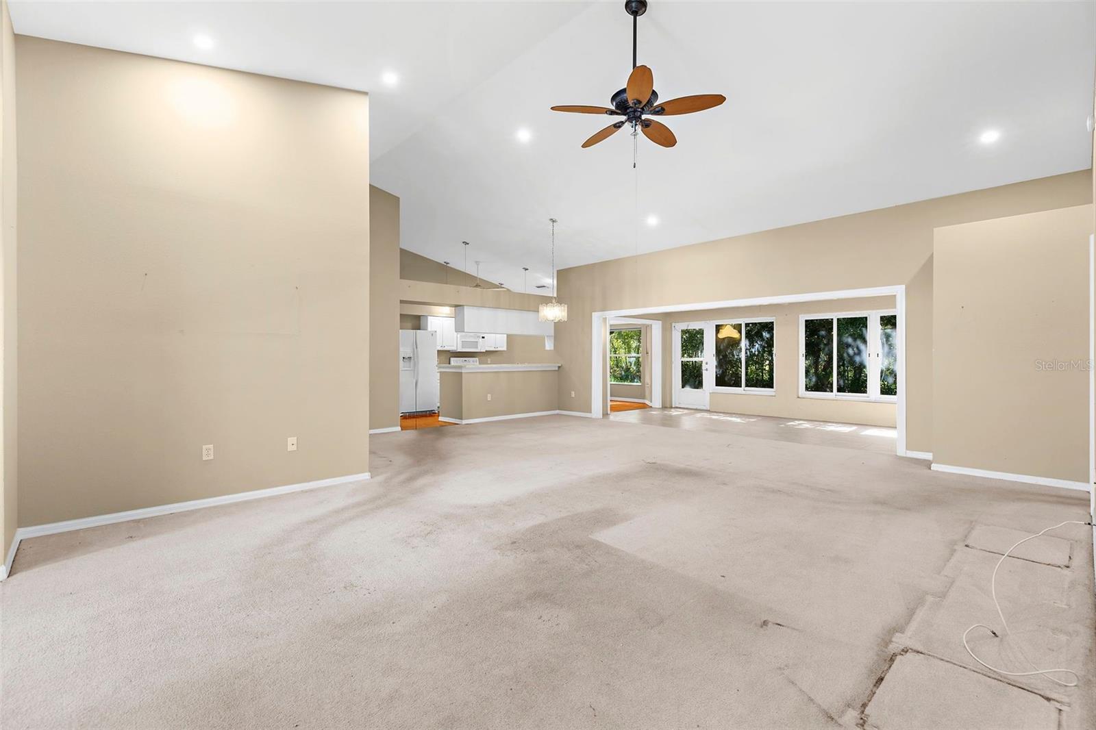 Open Floor Plan with added sq footage from enclosed sun room.