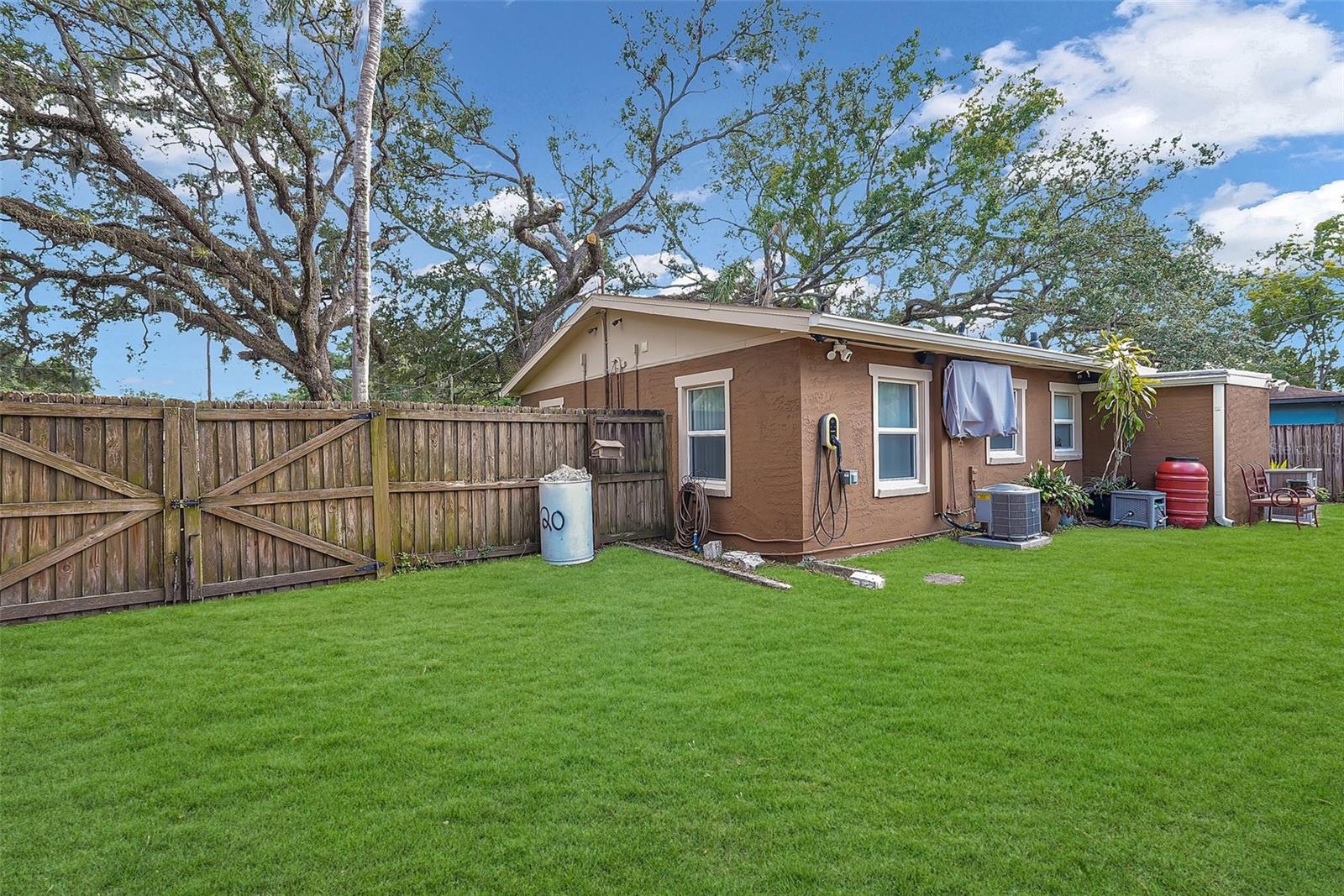Large gates on both sides of the yard.