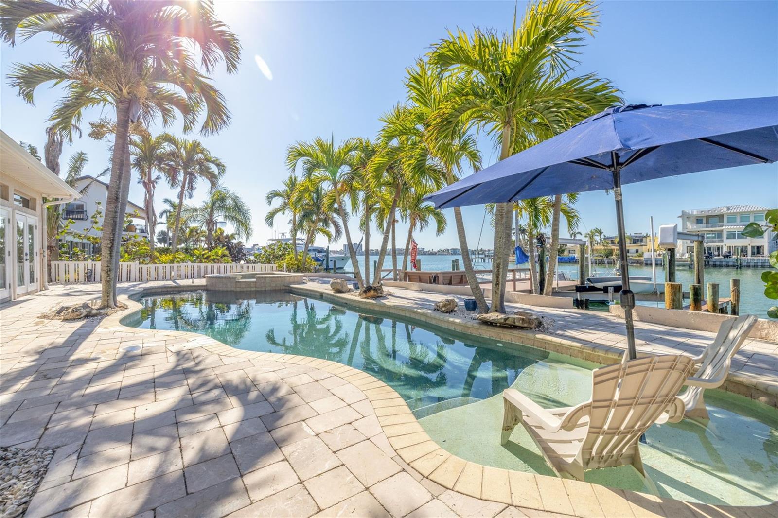 Waterfront pool and hot tub