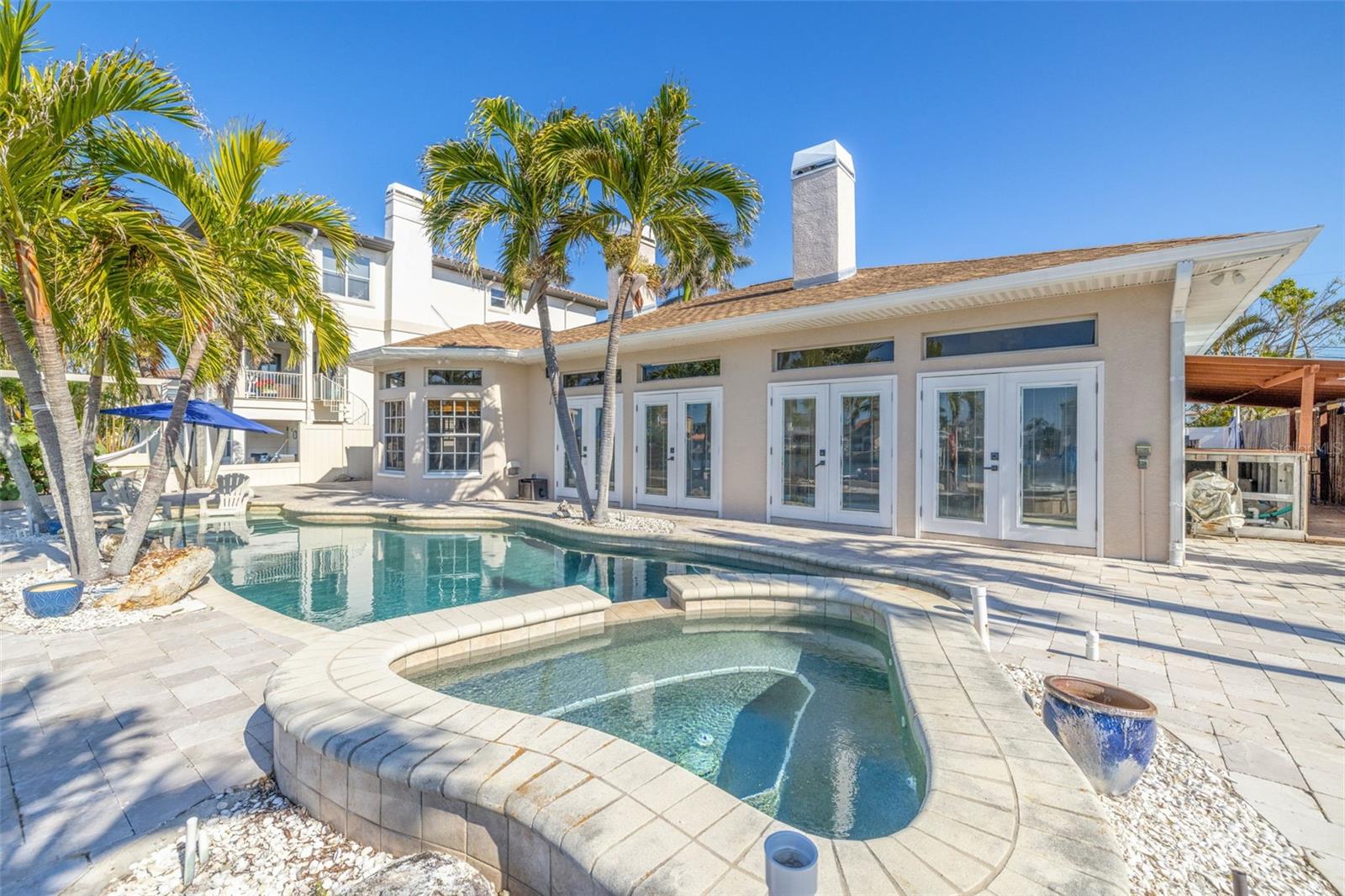 Pool and hot tub outside french doors