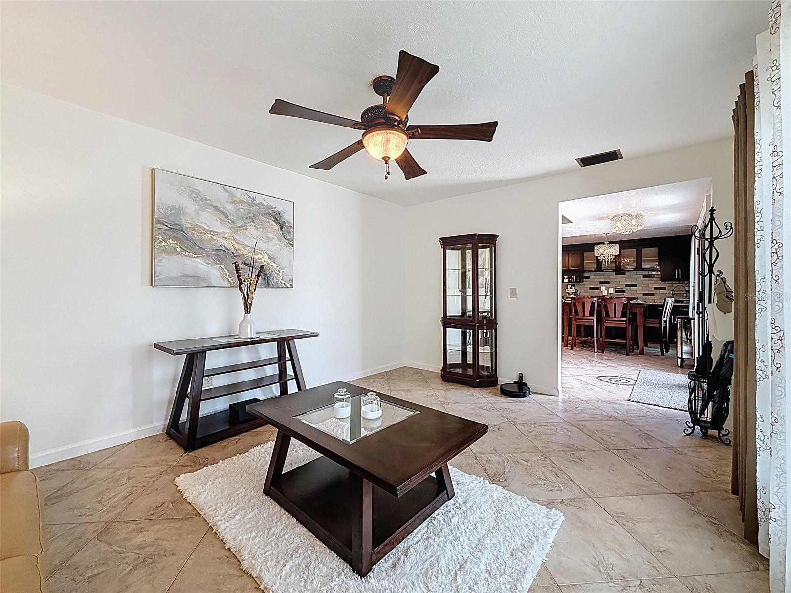 Formal dining room currently used as extra living room because of  large eat in kitchen