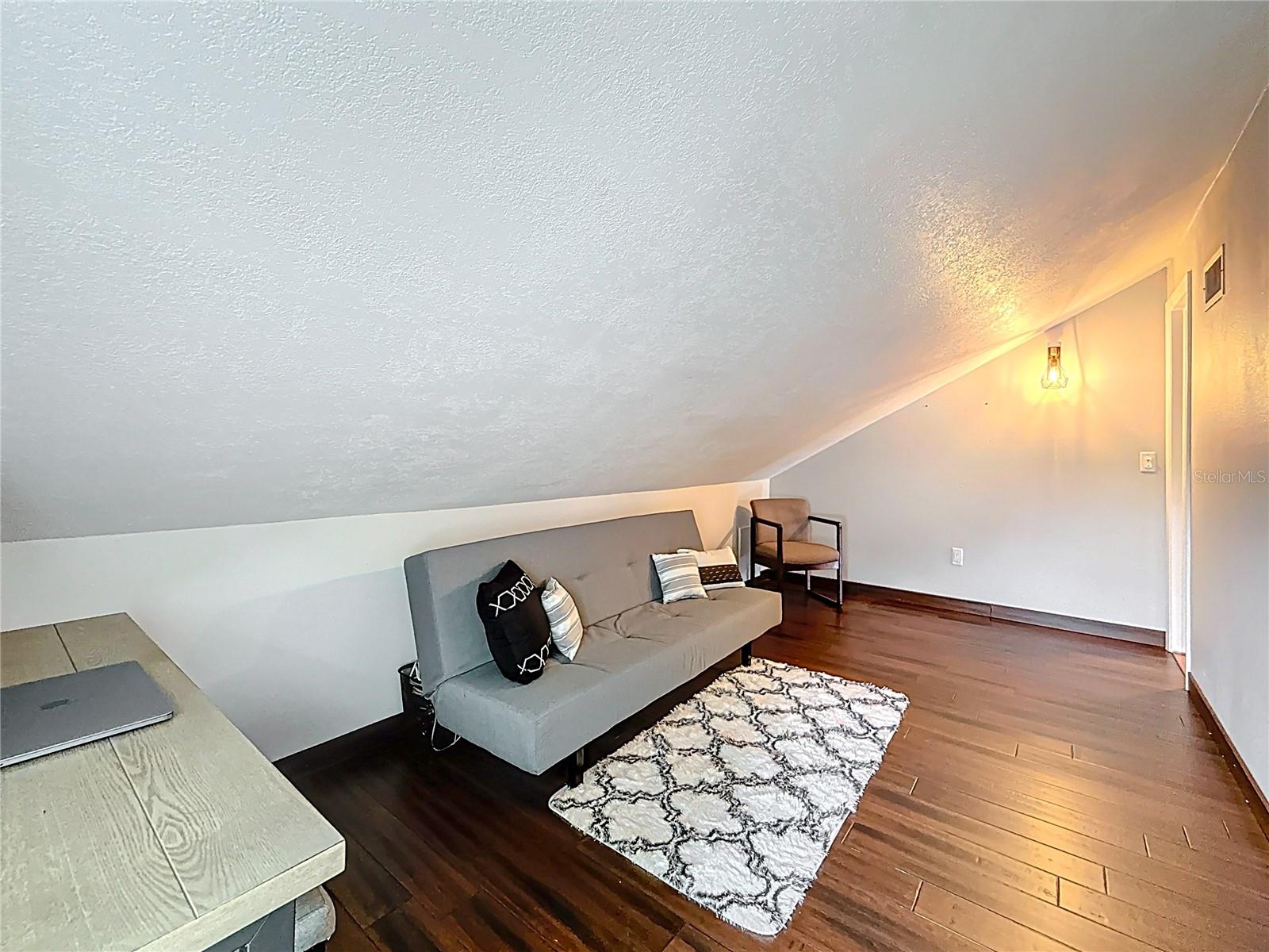 1st flex room with wooden floor