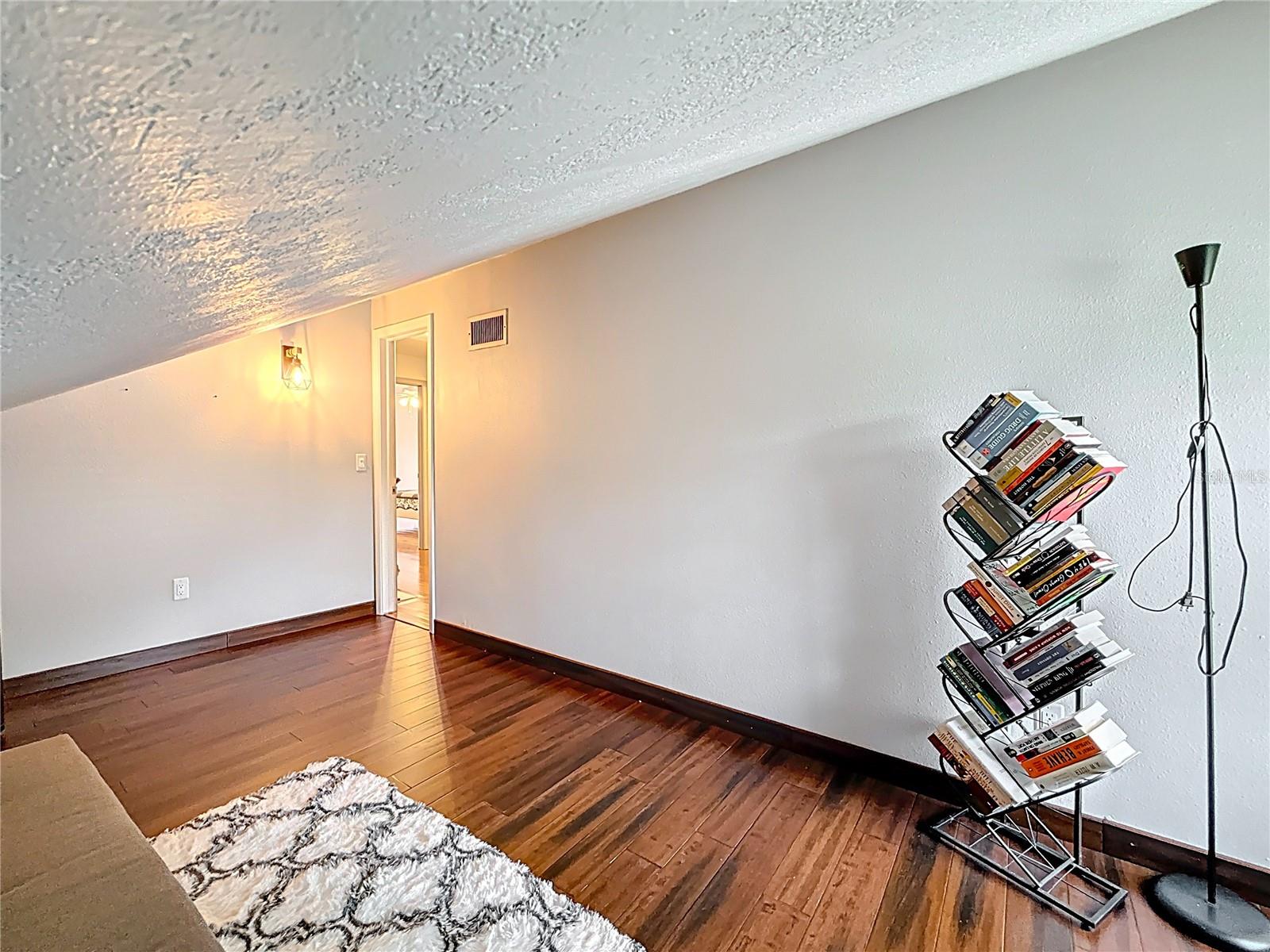 1st flex room with wooden floor