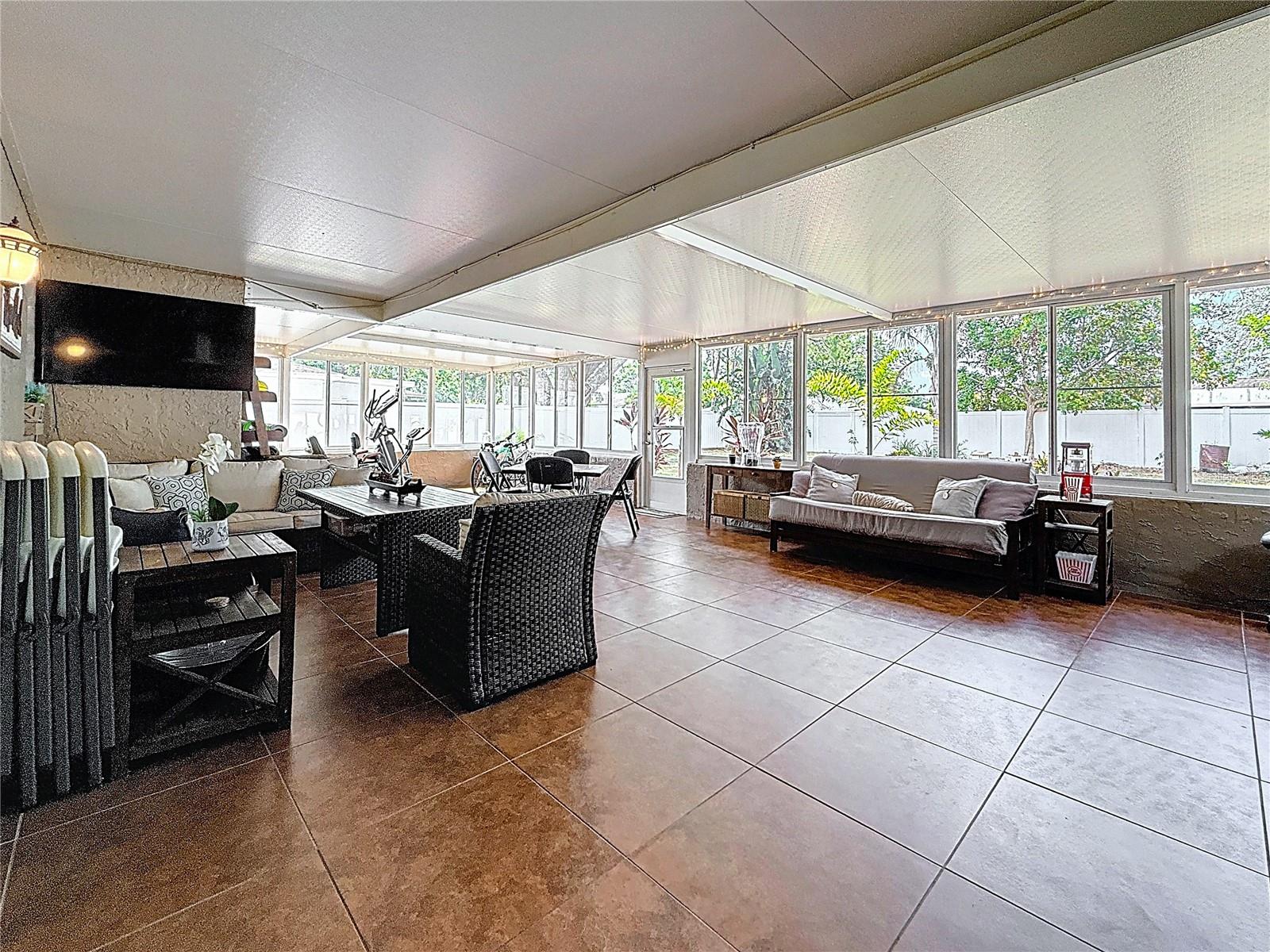 800 SF entertainment room with appliances