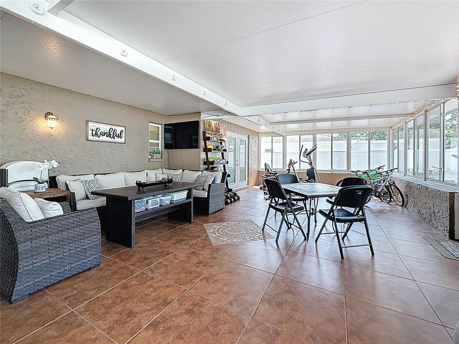 800 SF entertainment room with appliances
