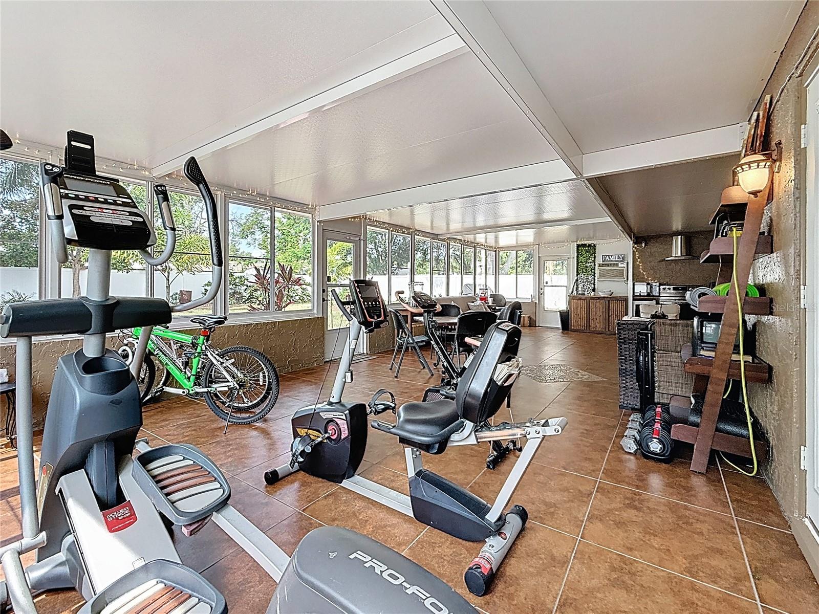 800 SF entertainment room with appliances