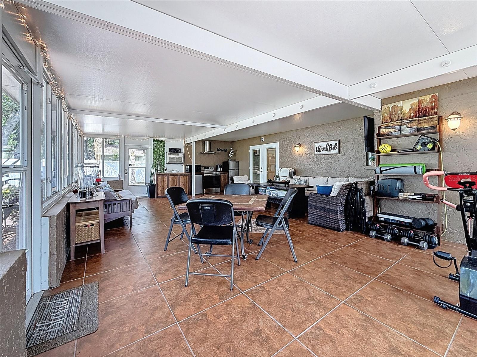 800 SF entertainment room with appliances