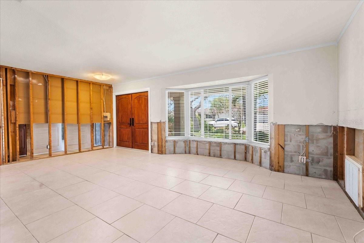 view of the front door and large front window