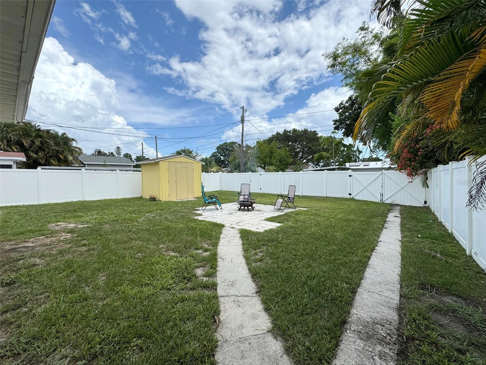 huge back yard with double gate access to back alley