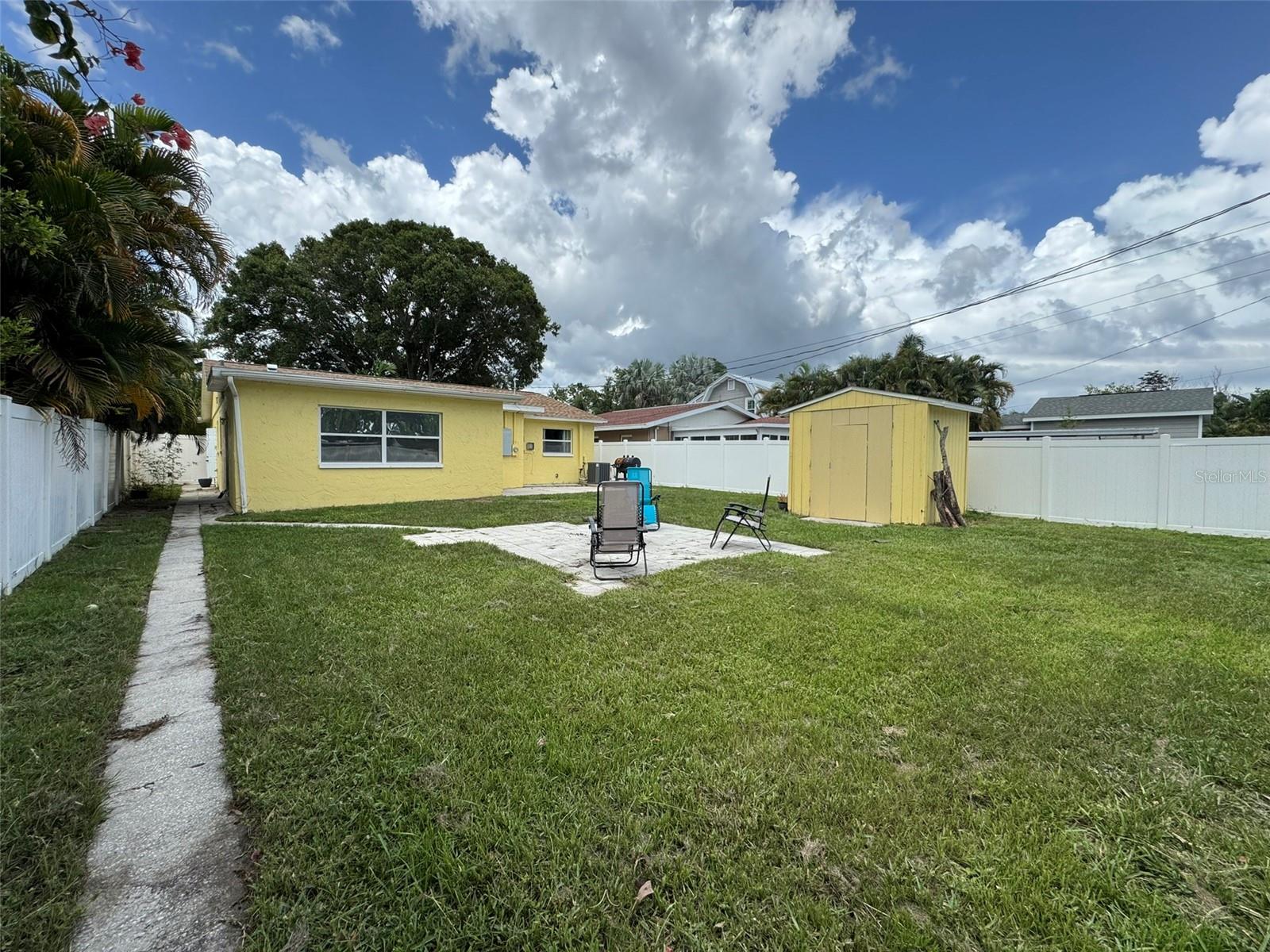 from fence gate towards house