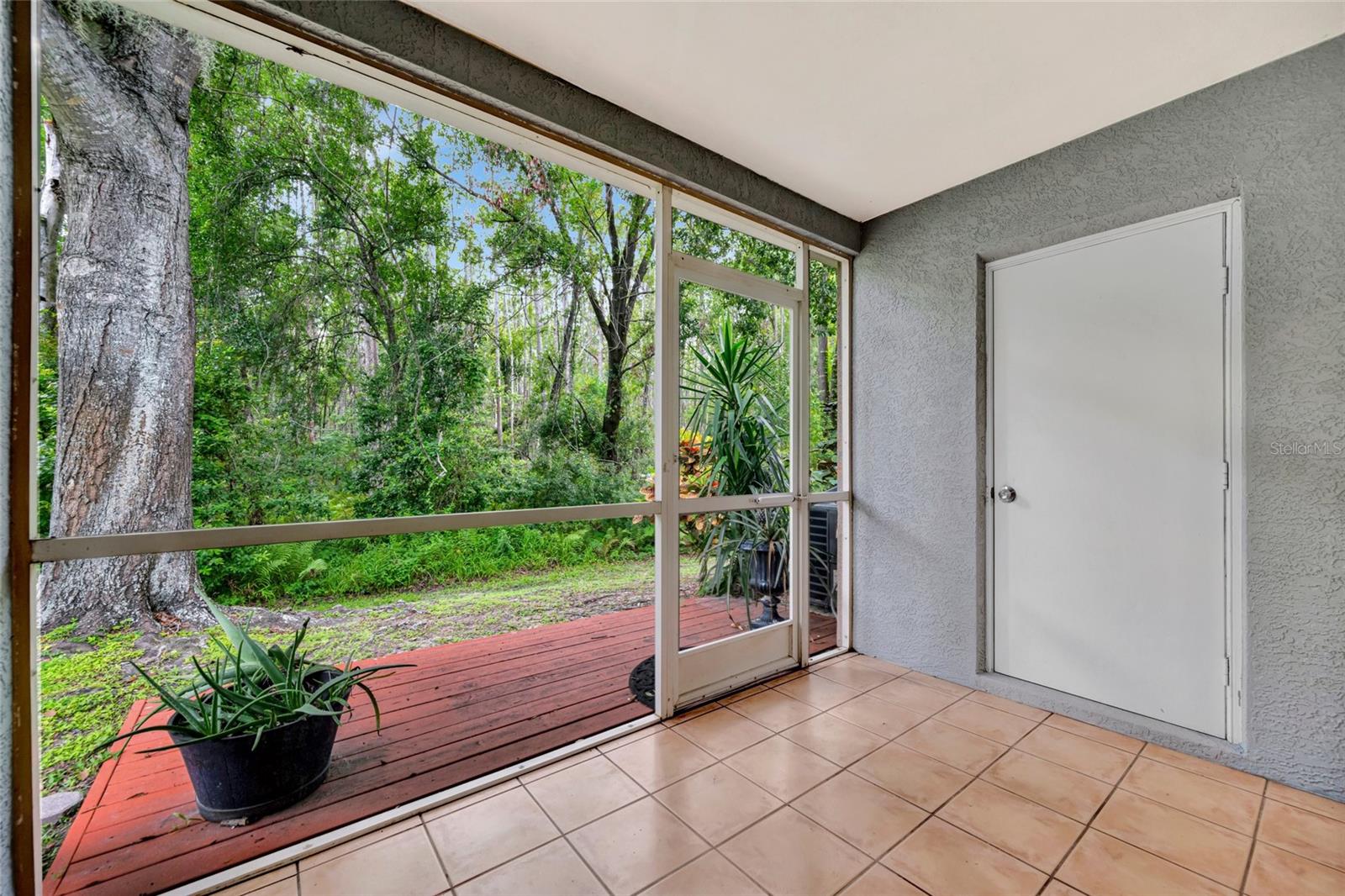 Screened-in patio with storage