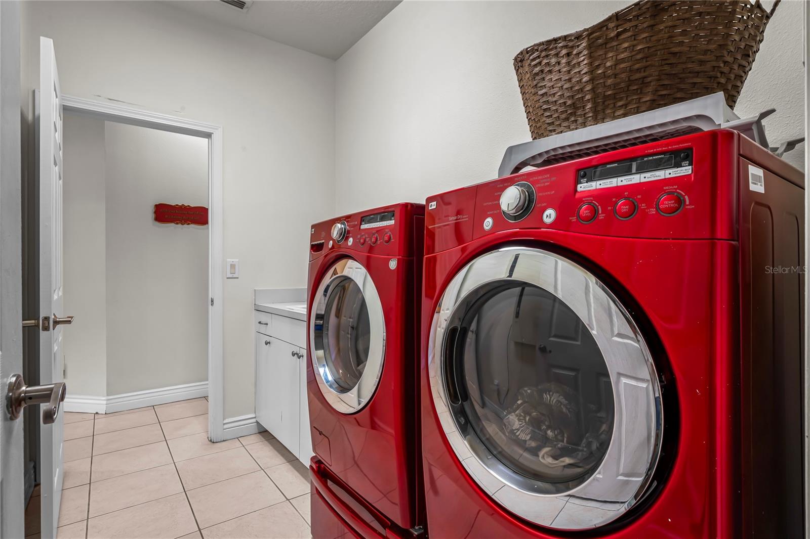 Inside Laundry Room off Garage and across hall is kitchen