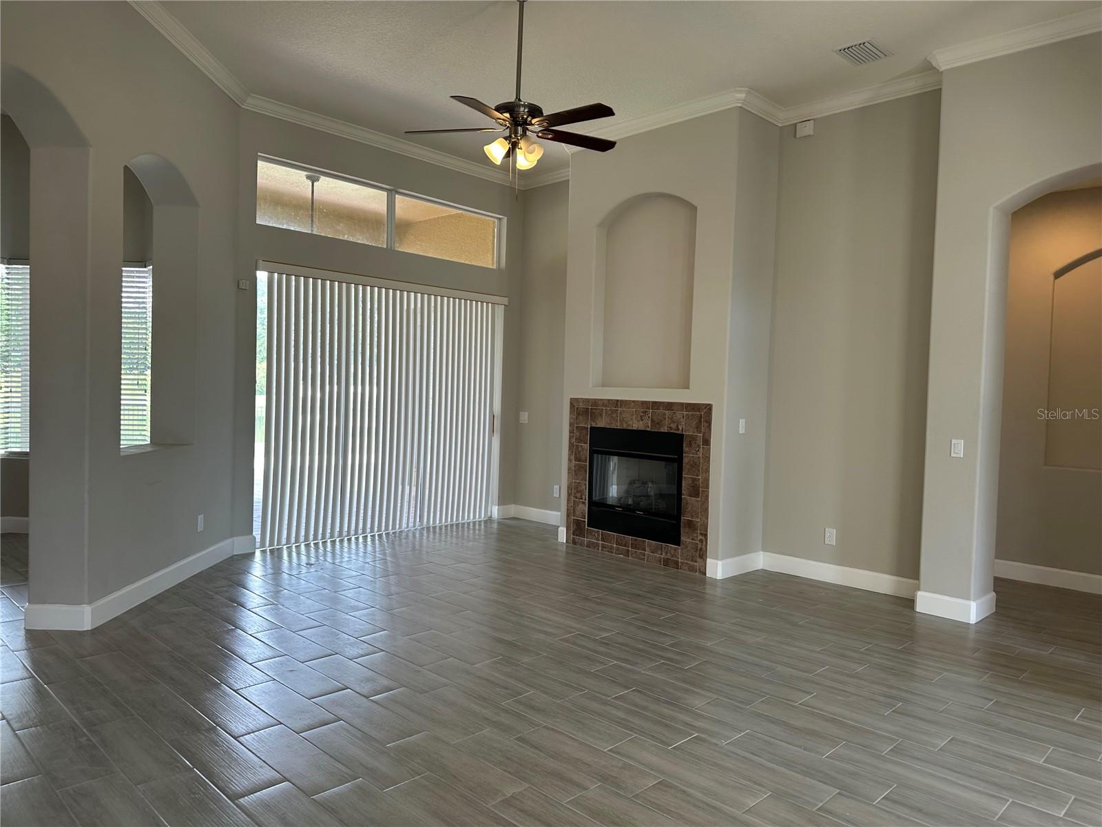 FIRE PLACE IN FORMAL LIVING AREA WITH THE POND VIEW