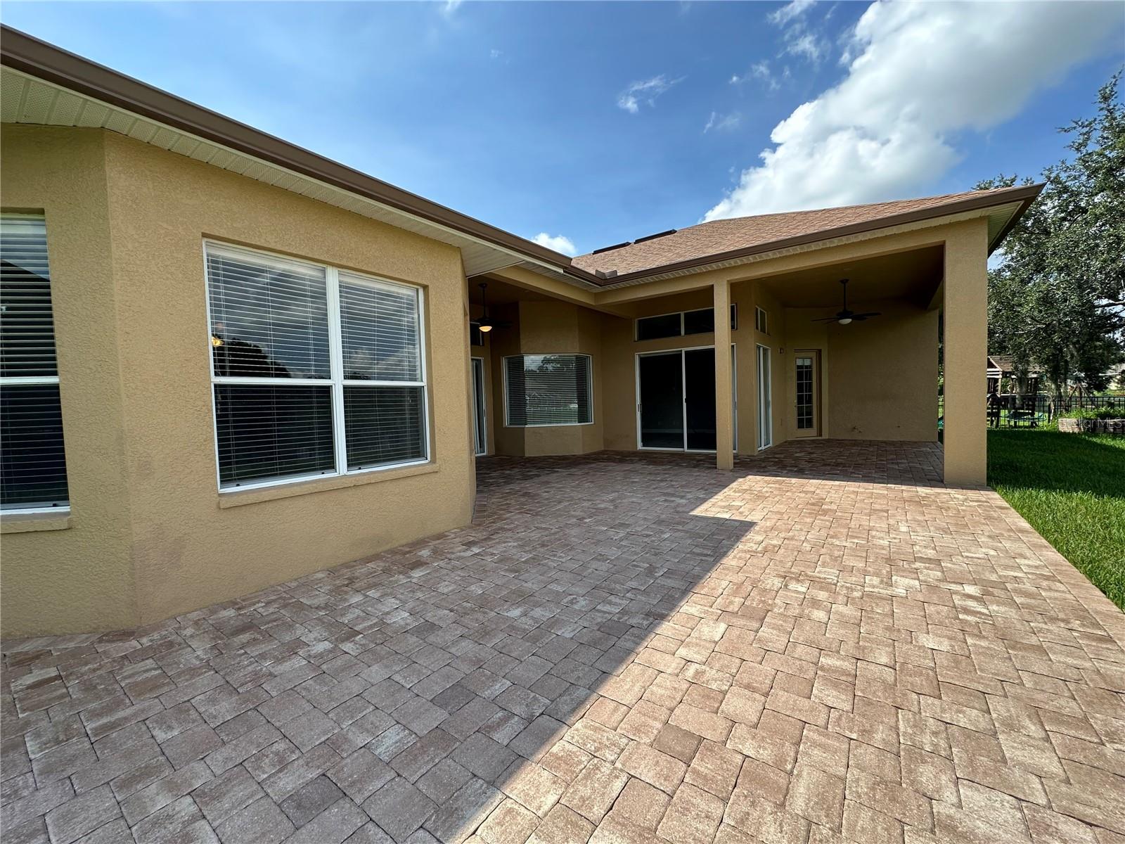 HUGE BRICK PATIO IN THE BACK YARD