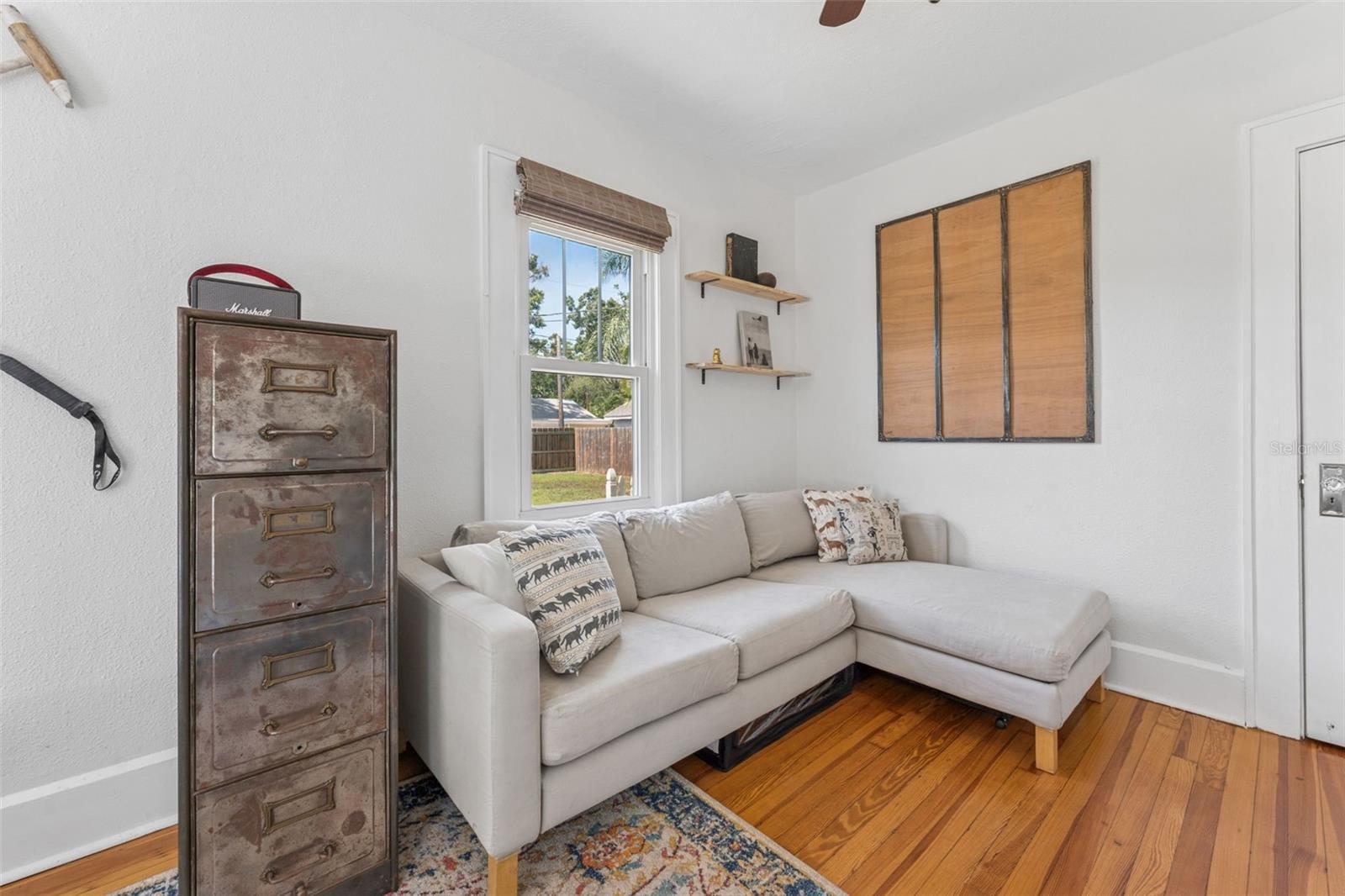Primary bedroom has enough room for a sitting area.