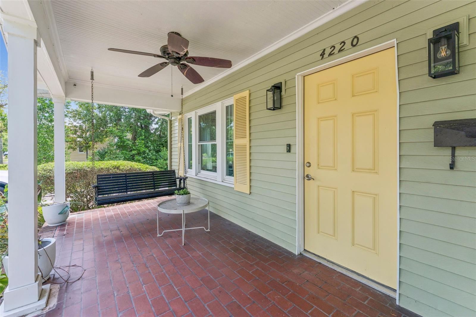 Enjoy a book and an iced tea on your wonderful front porch