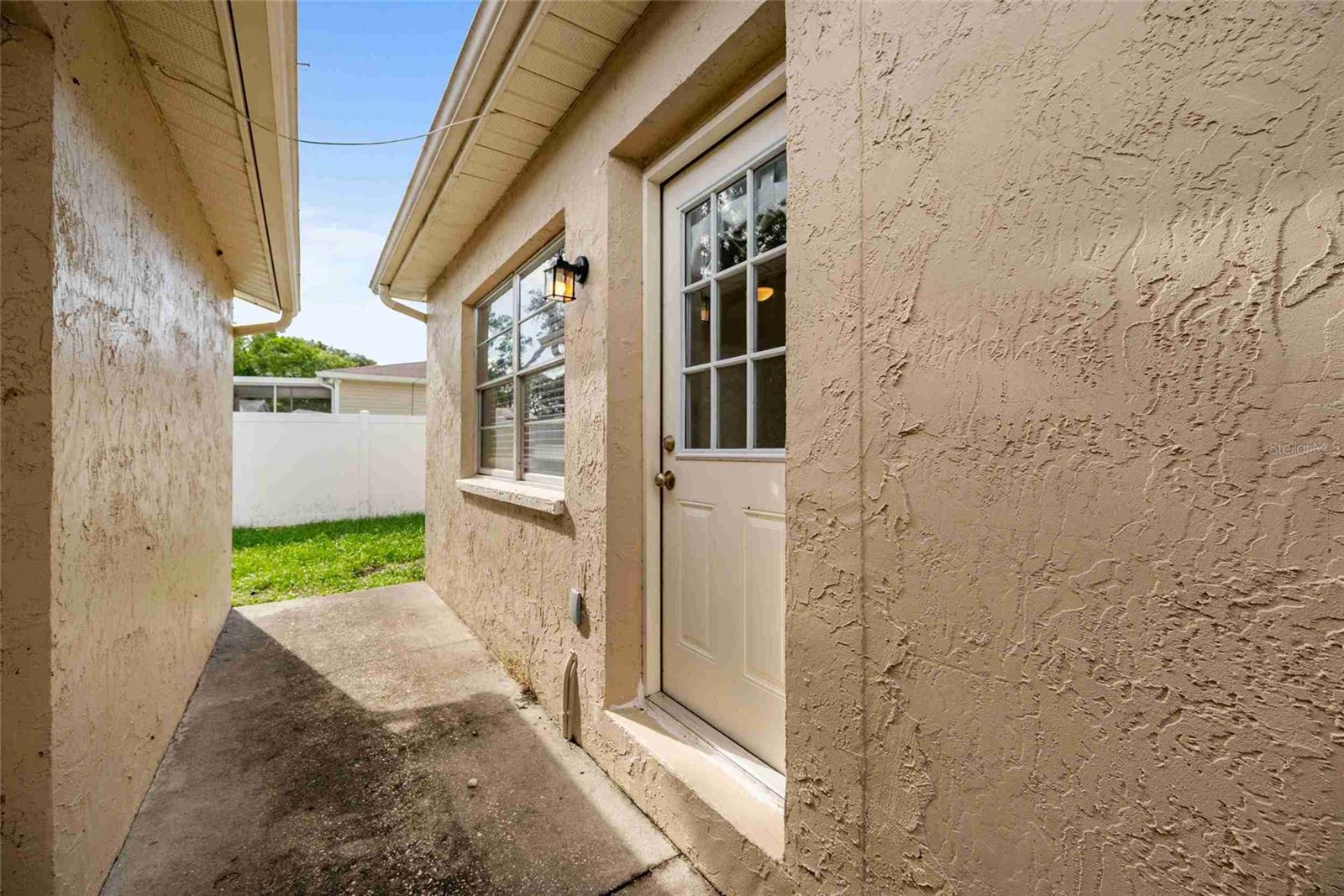 Concrete Sidewalk between home & Back Garage