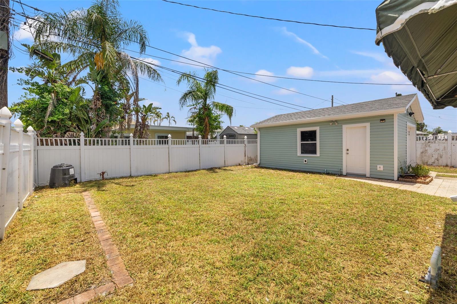 Detached oversized garage, fully fenced yard