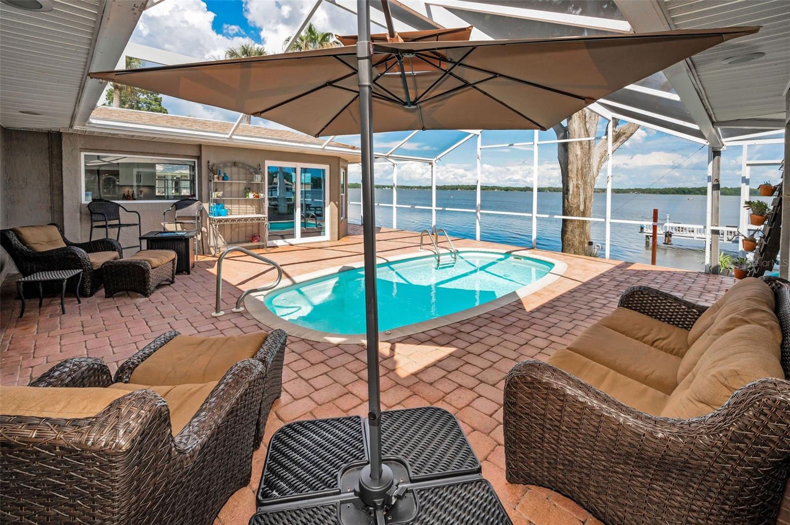 Resort living - pavered pool overlooking fabulous Lake Tarpon