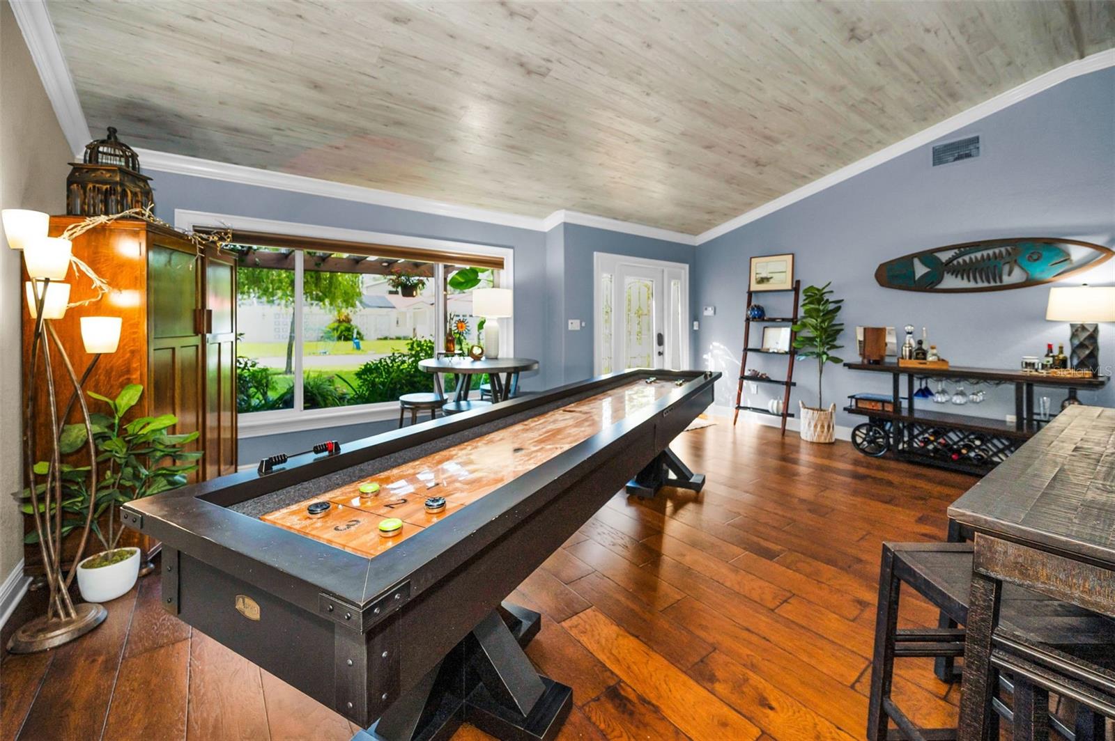 Game area in great room is versatile - could be dining or office space