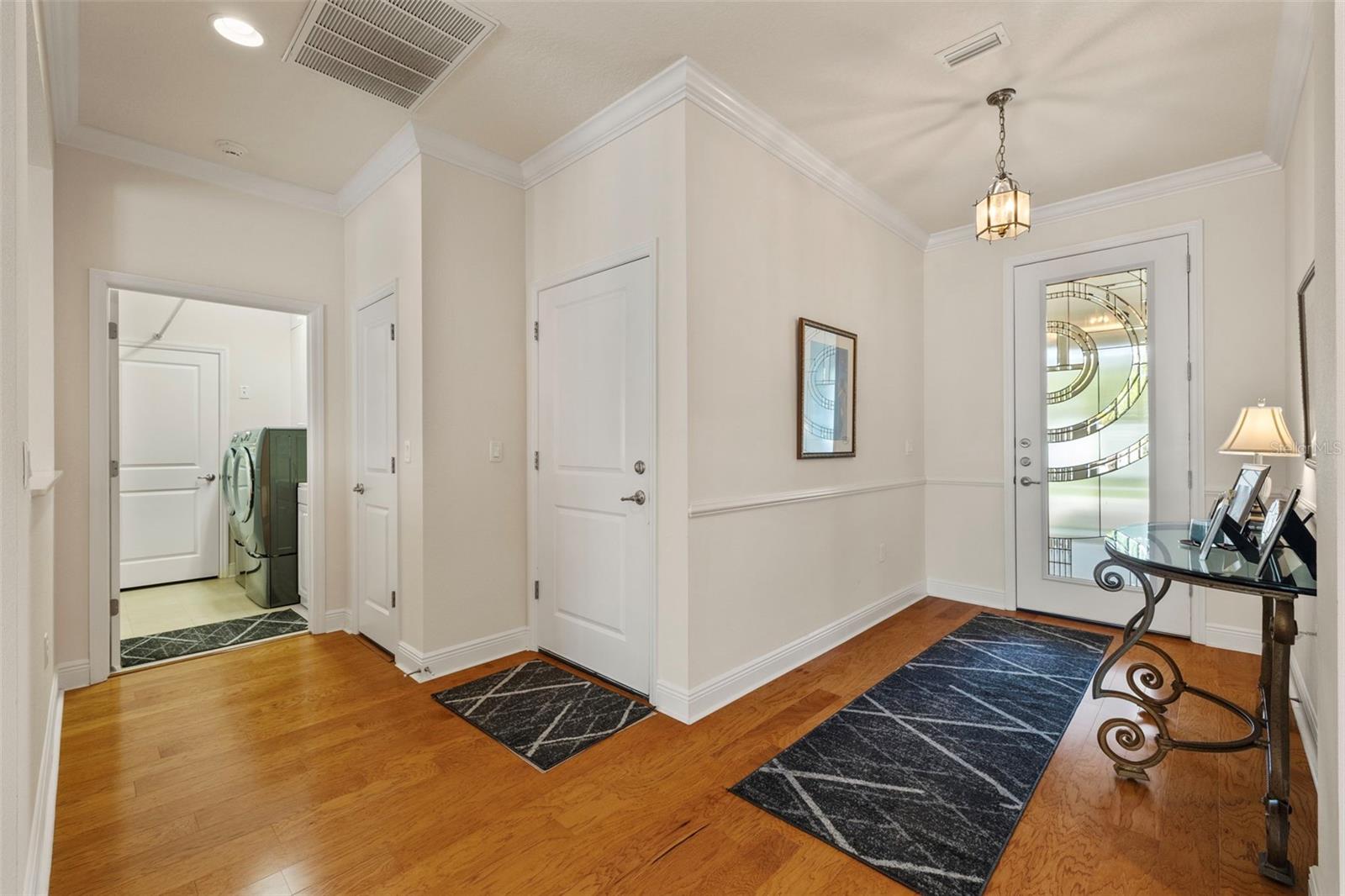Foyer and hallway to laundry room