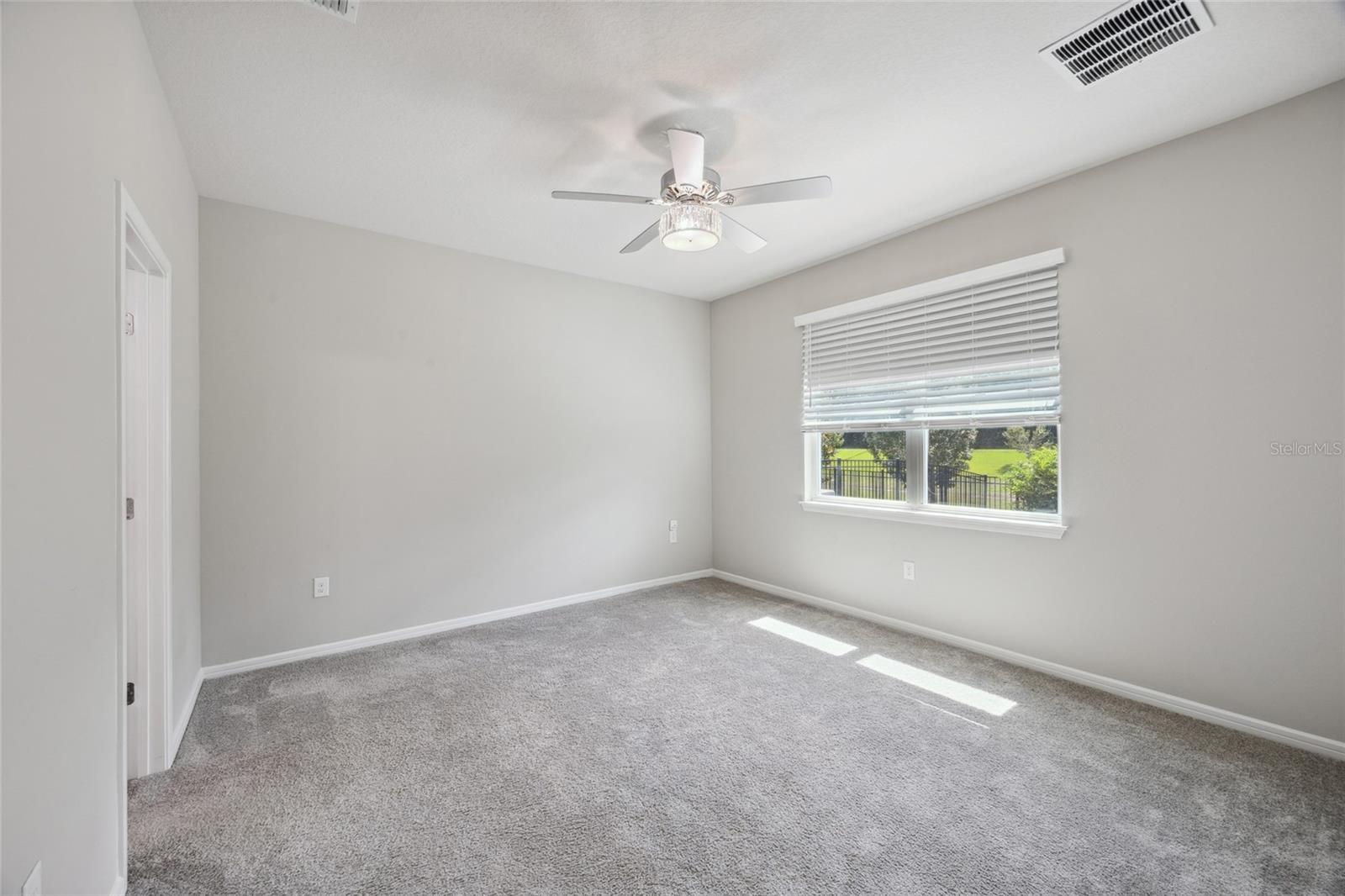 PrimaryBedroom designer fan , blinds and beautiful views