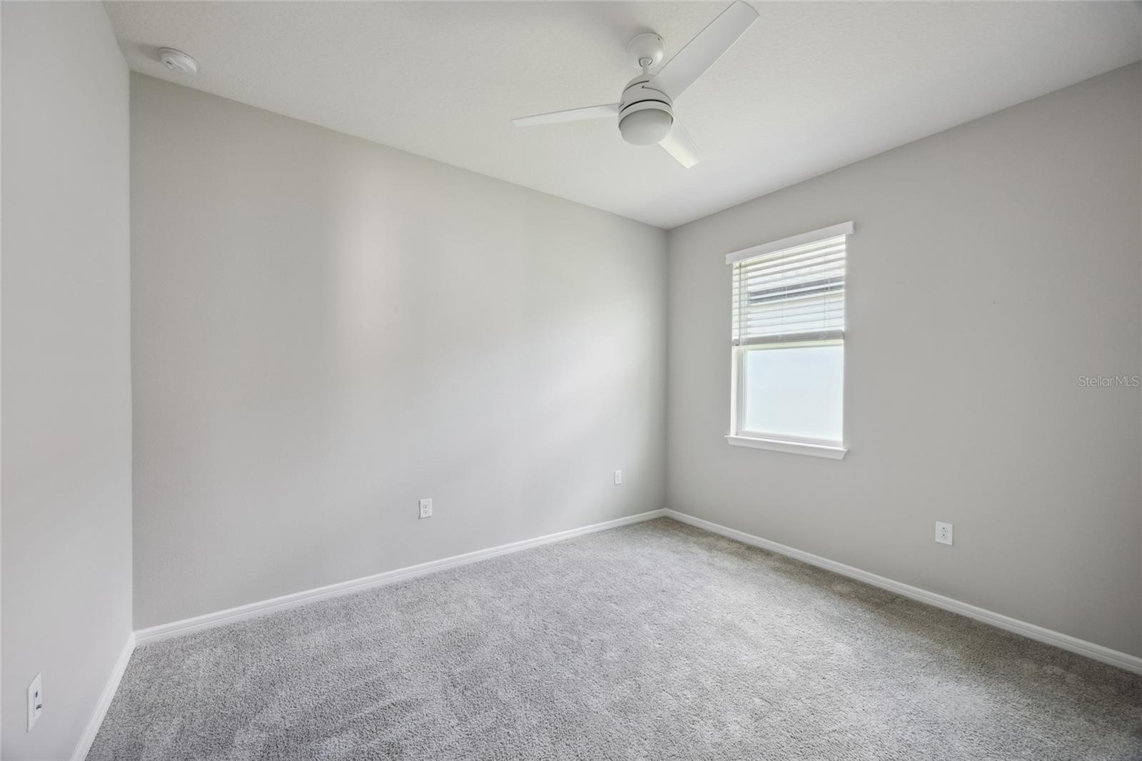 Bedroom 3, custom built in closet, ceiling fan