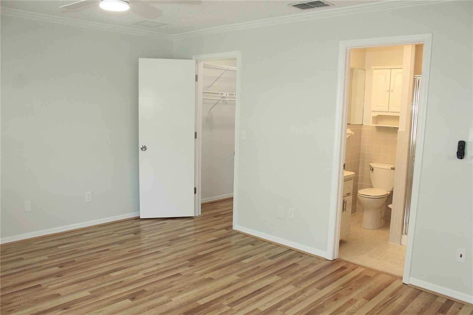 Owners suite with walk in closet a& ensuite bath