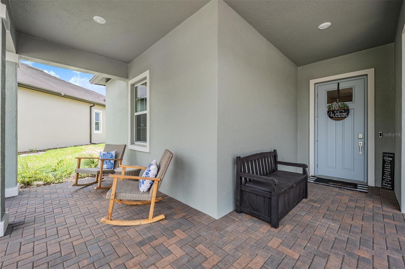 Wonderful covered front porch with pavers