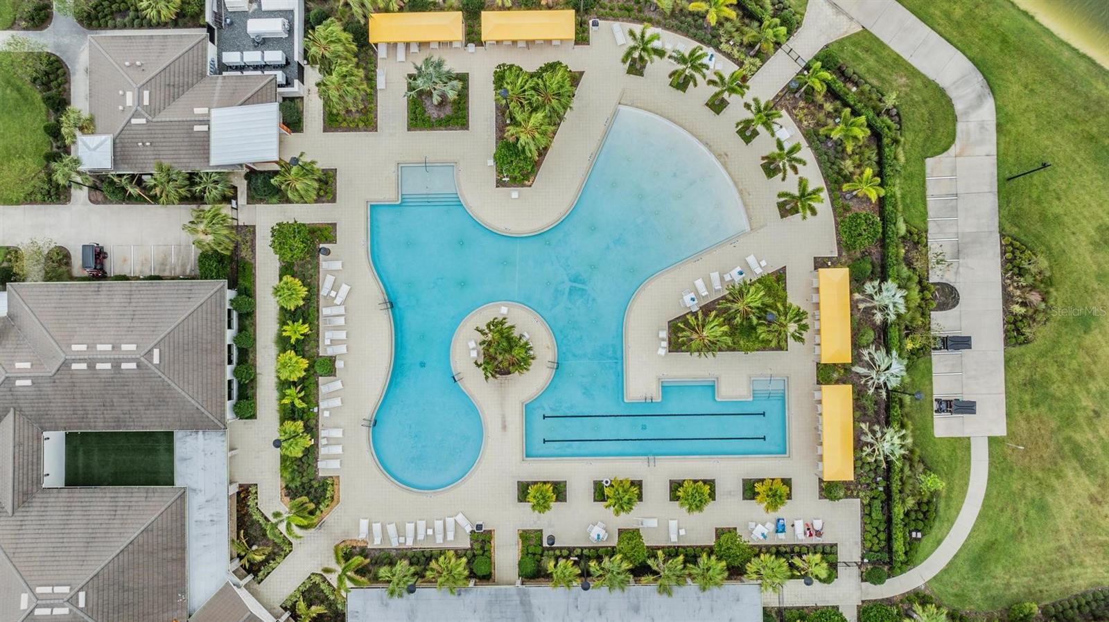 heated pool with lap lanes, and covered cabanas