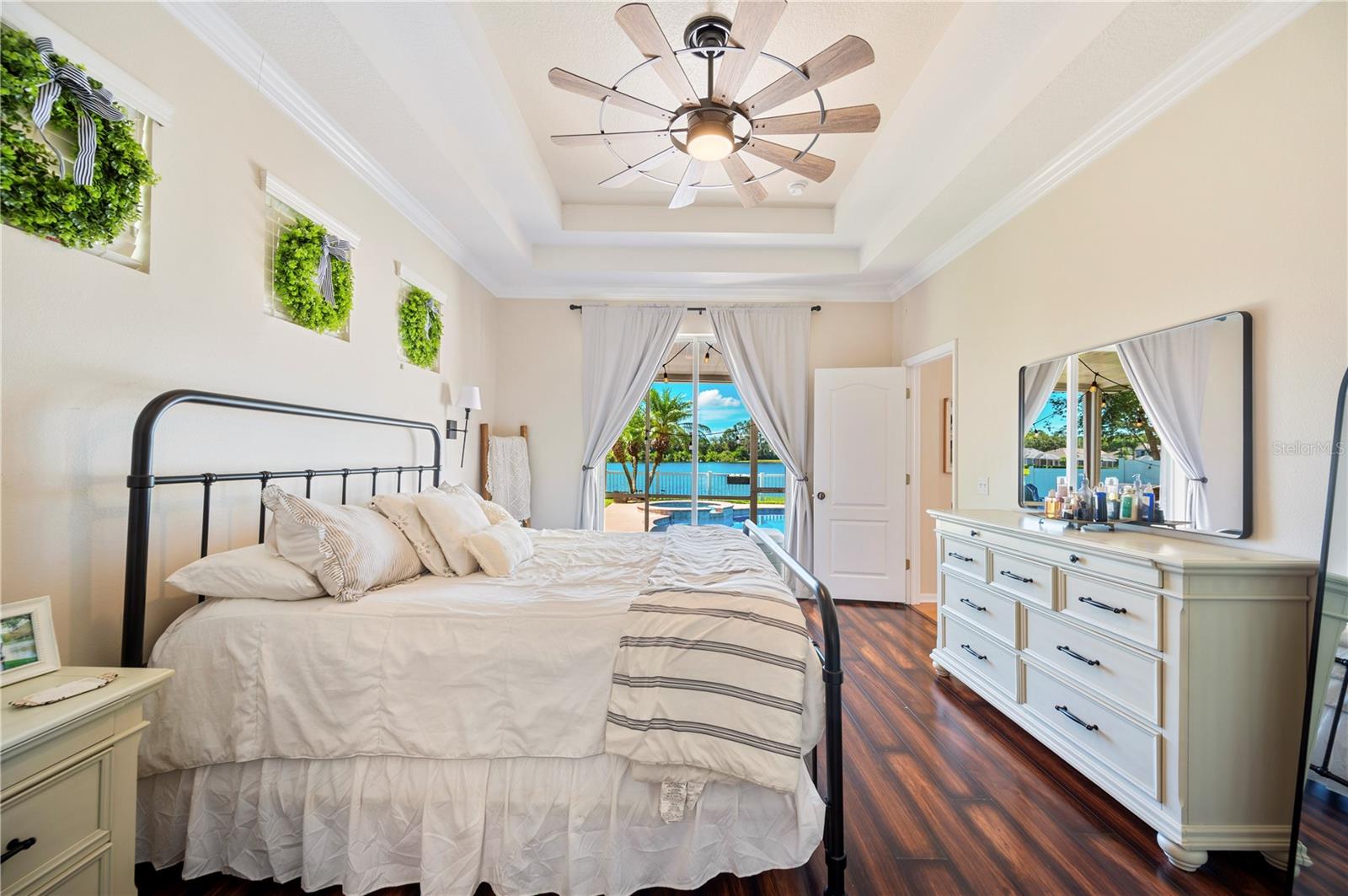 Primary Bedroom open to pool and spa