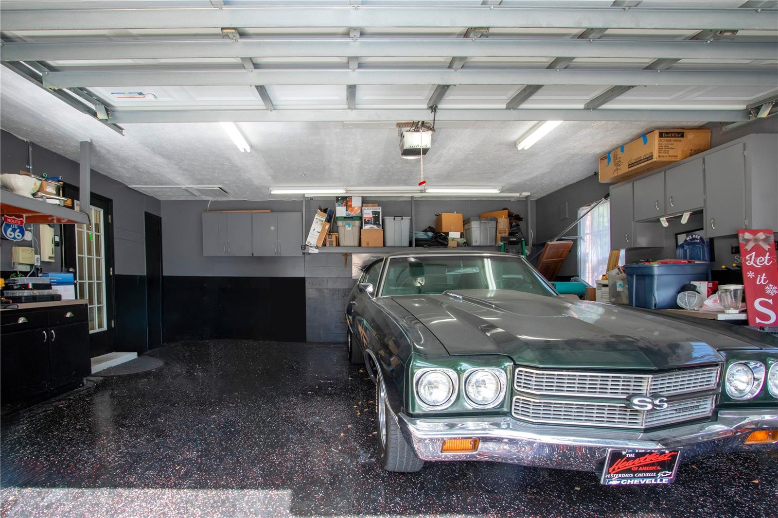 2 car garage attached to home. Door leads to kitchen.