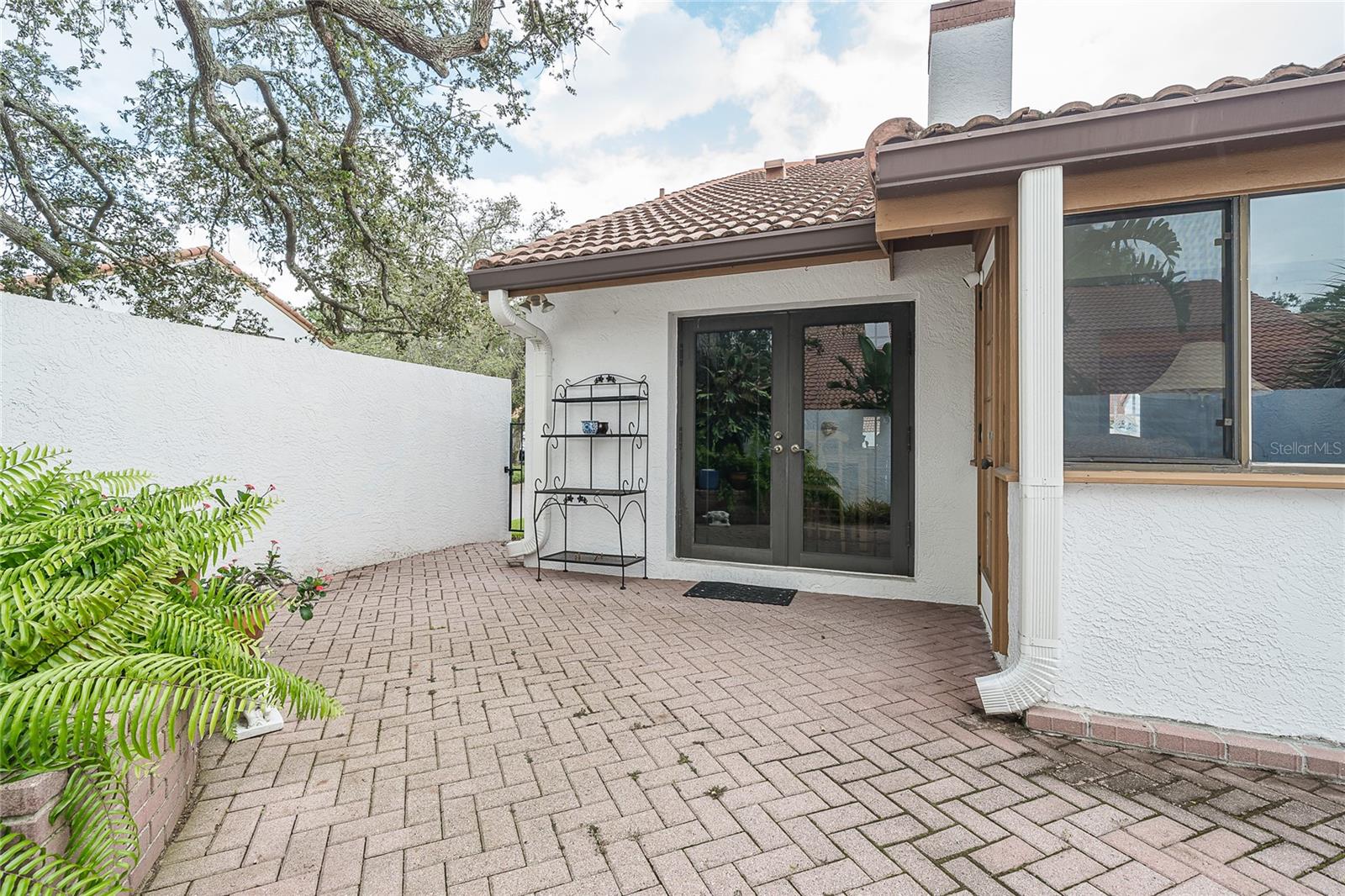 Doors leading to back of home