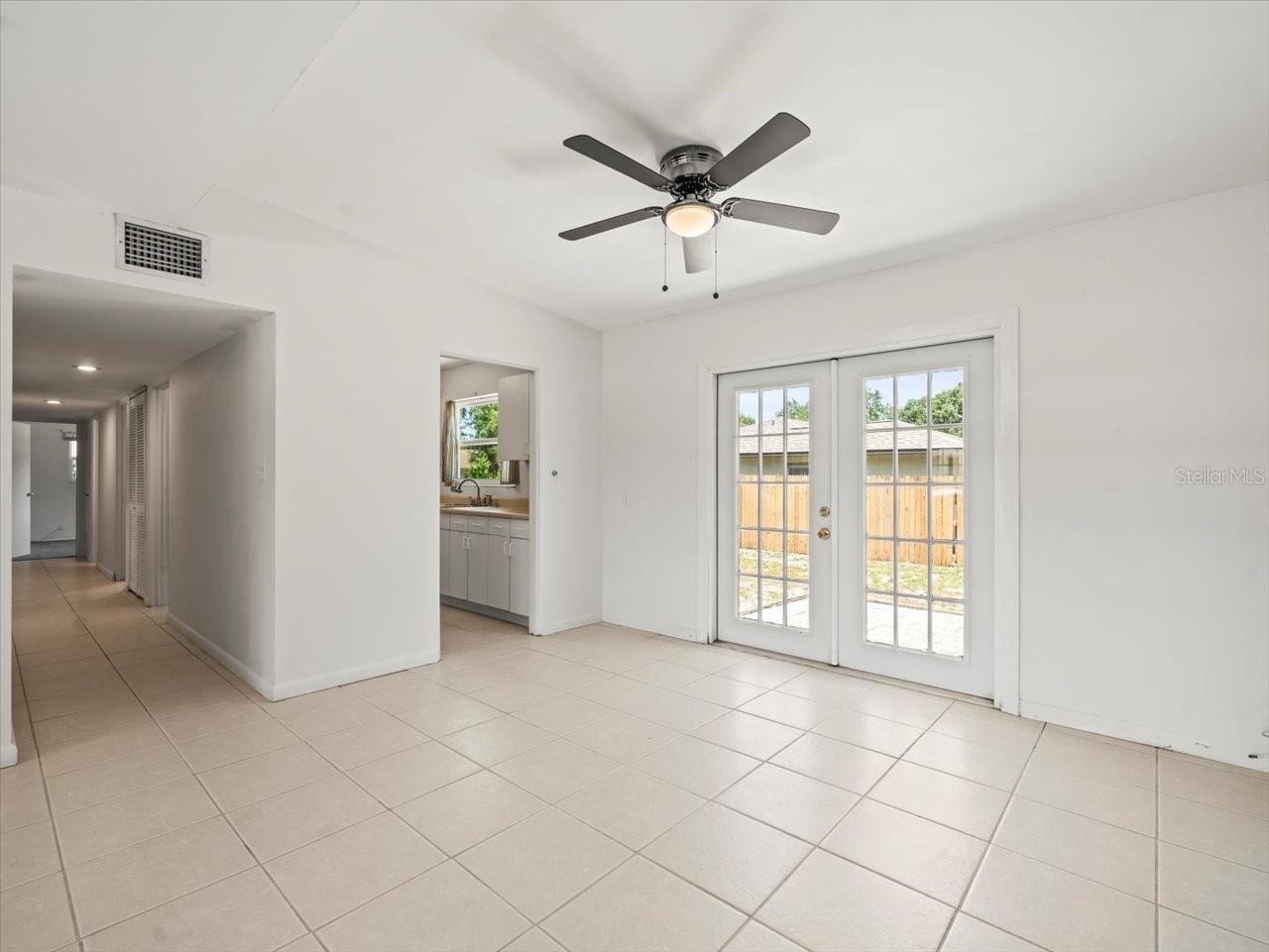 Hallway to Bedrooms | Kitchen access off Dining Room | Patio Access