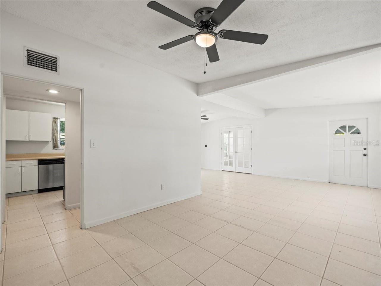 Living Room access to kitchen & hallway to bedrooms