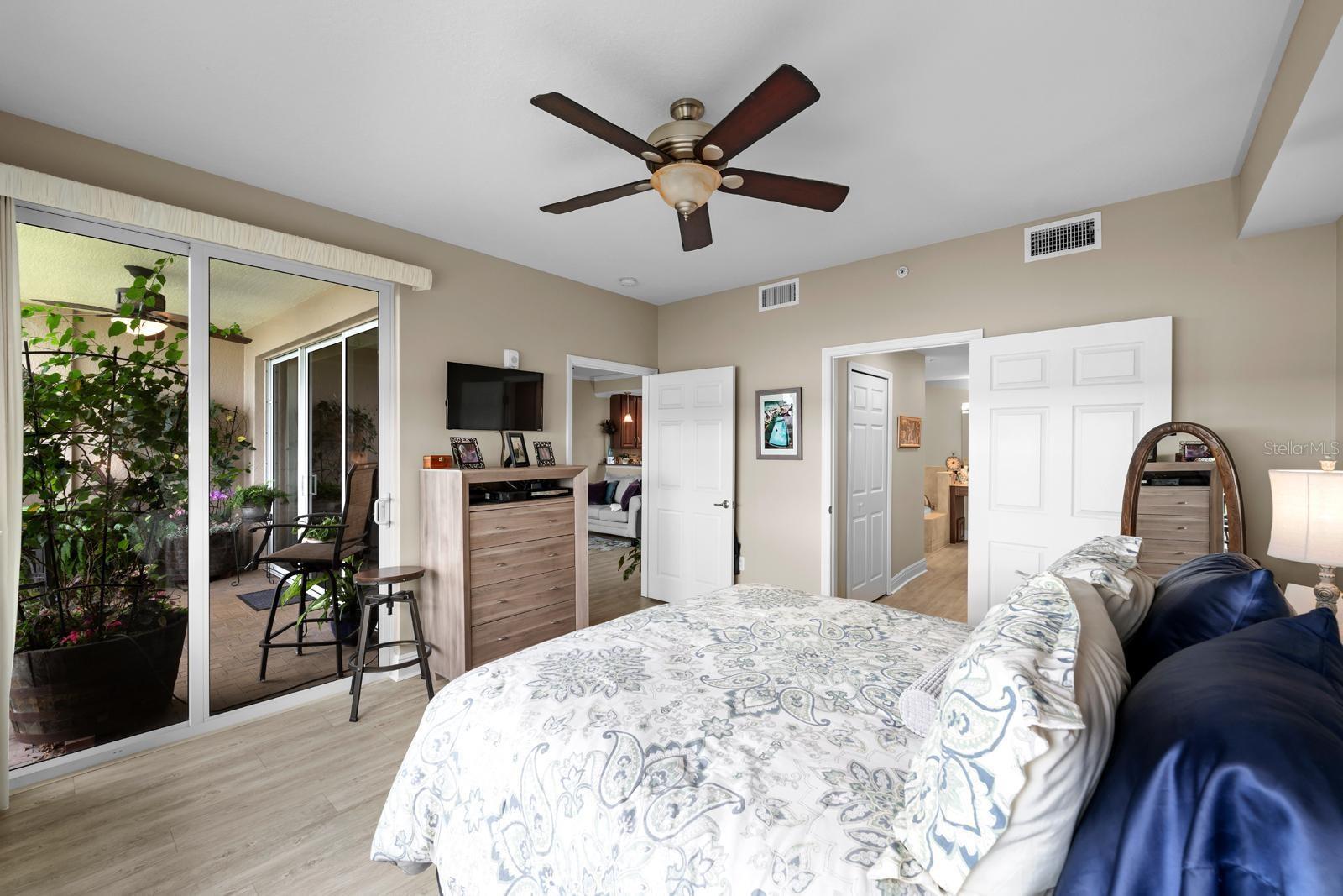 High quality LVP flooring and a lighted ceiling fan....plus the glass slider doors and windows are the highest quality and storm-rated ES windows.