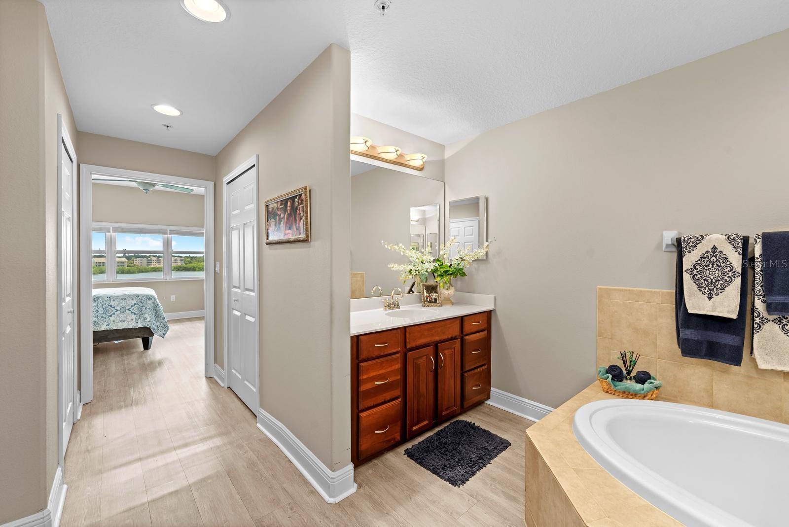 The second vanity has its own sink, and there are TWO walk-in closets