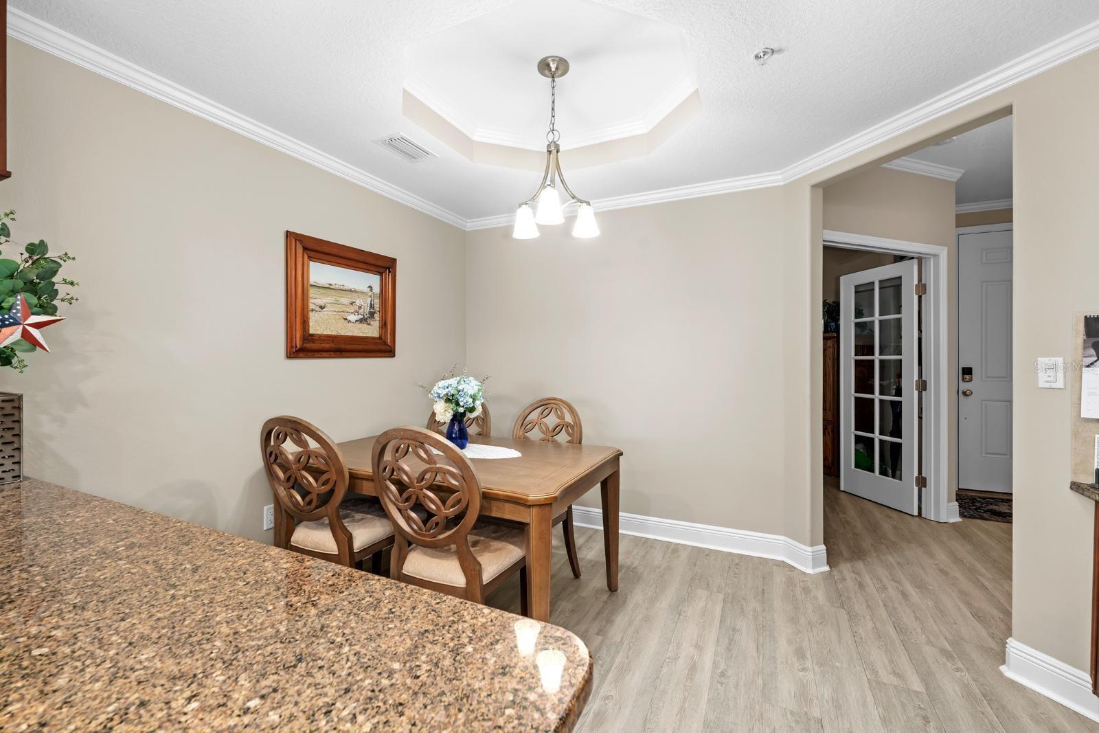 Notice the crown molding that is consistent throughout the main areas of the condo.  The upgraded baseboards are the same throughout the entire condo.